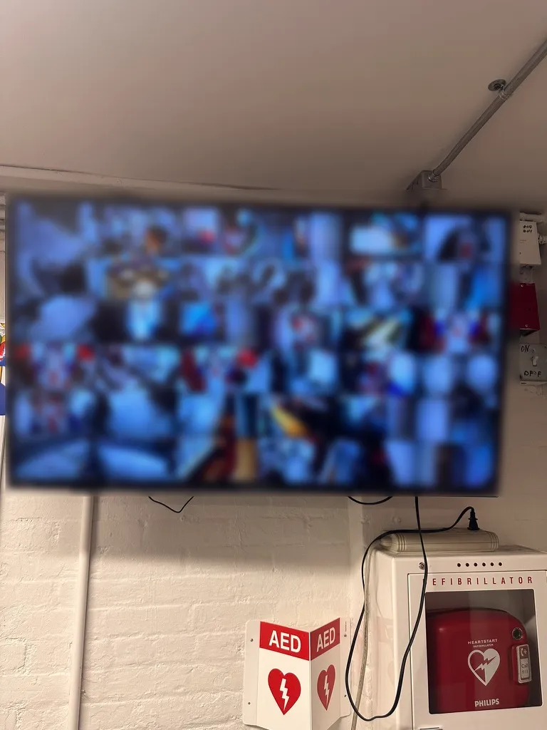 Academy of the City: Cameras, Vape Sensors, PA and a New Network Across Two Schools 3 Security monitor showing live camera feeds across Academy of the City Charter School, installed by Solved IT