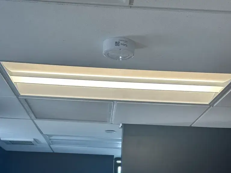 Vape Detection & Smart Sensor Systems NYC, NJ & CT 9 Triton vape sensor installed on a school bathroom ceiling by Solved IT, with no cameras in the space