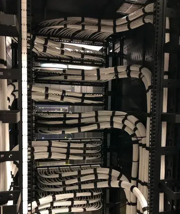 Network rack with patch panels and switches installed by Solved IT at the Gastroenterology of Westchester surgical center