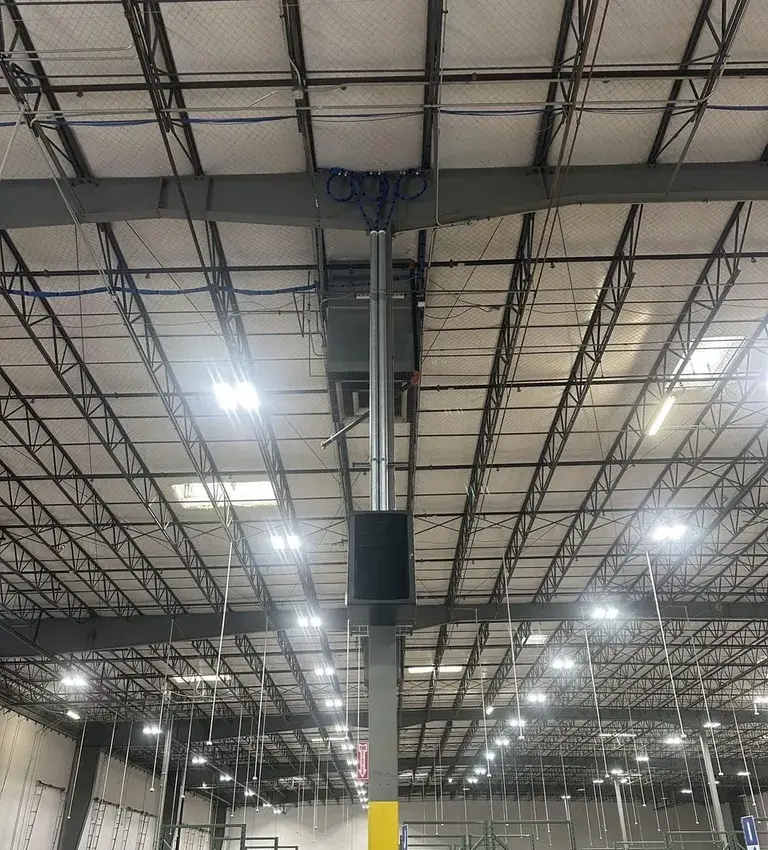 Lindenmeyr Munroe: Moving a Northeast Distribution Center Onto a New Cisco Network 3 Overhead cable runs across the 150,000+ sq ft Lindenmeyr Munroe warehouse, installed by Solved IT