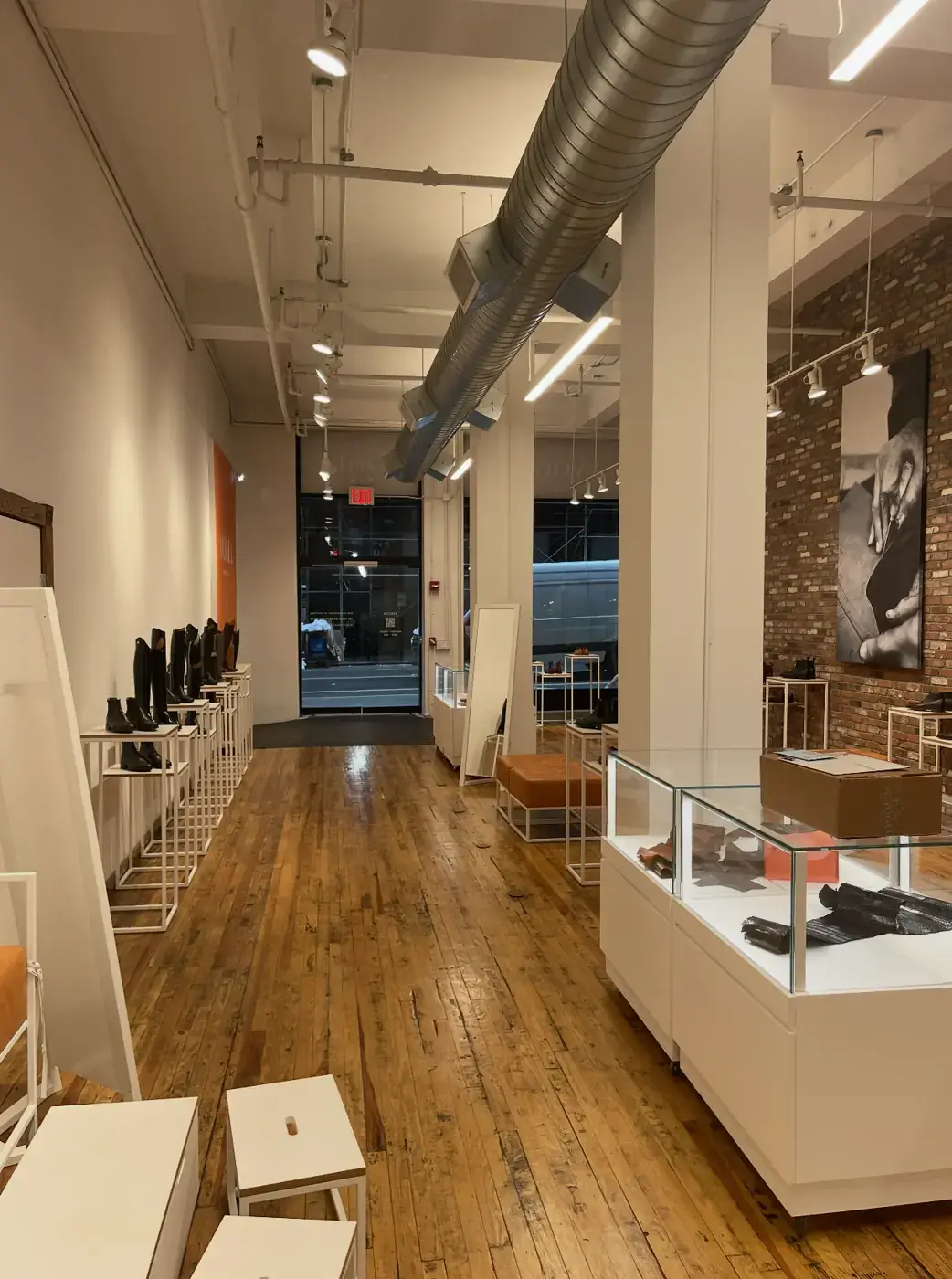 Retail store sales floor in New York City with display cases and shoe displays